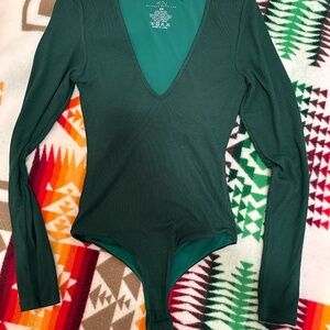 KLASSY NETWORK Emerald green V neck bodysuit, never worn - XS